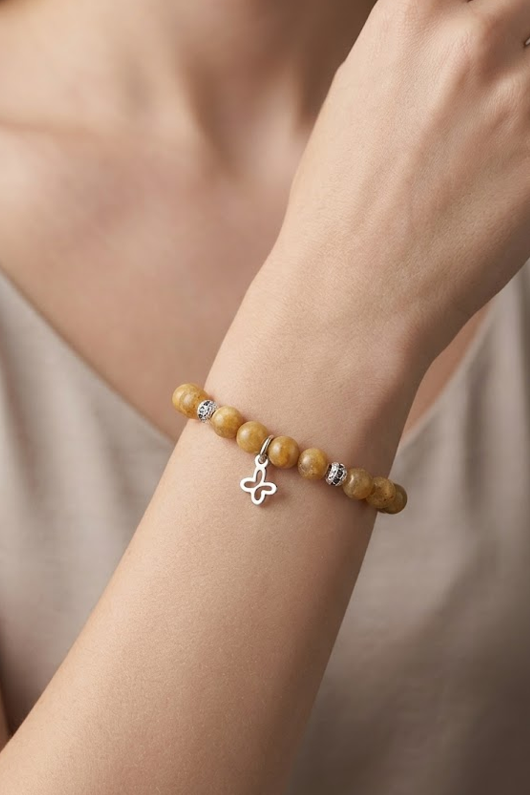 Pulsera Plata Esenciales 2026 Piedra Sol con Mariposa Mini