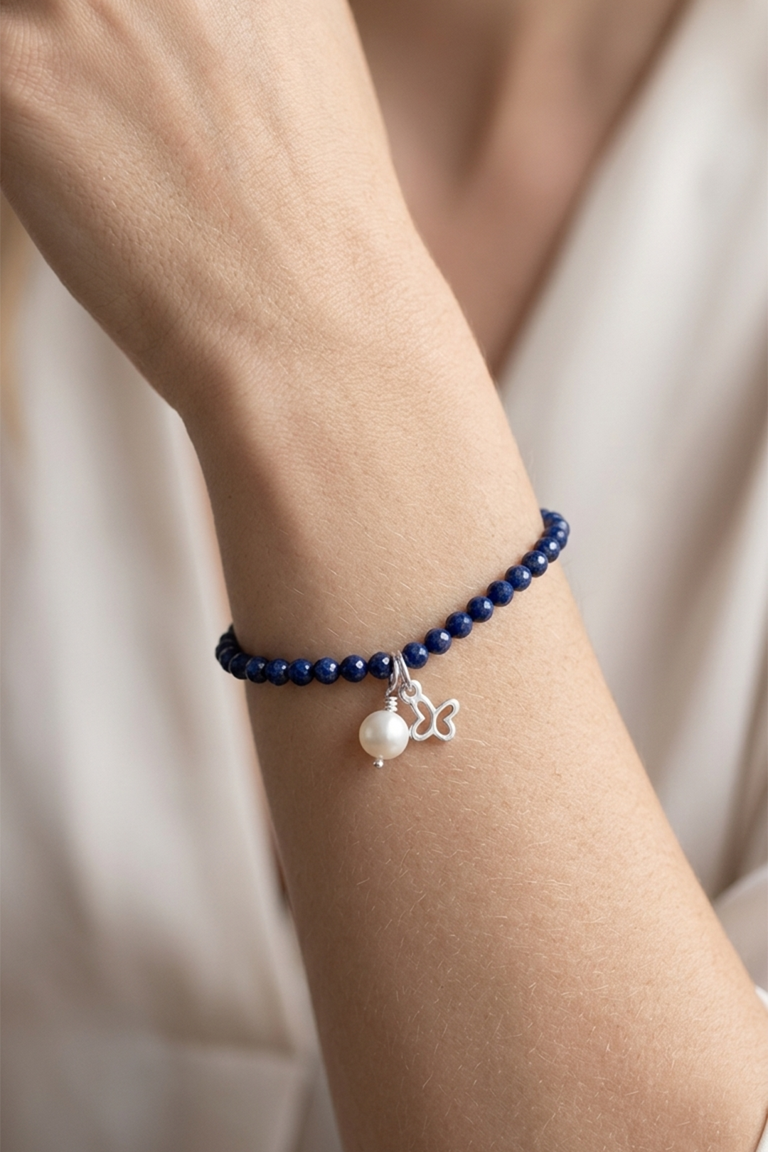 Pulsera Plata Esenciales 2026 Lapislázuli con Mariposa y Perla