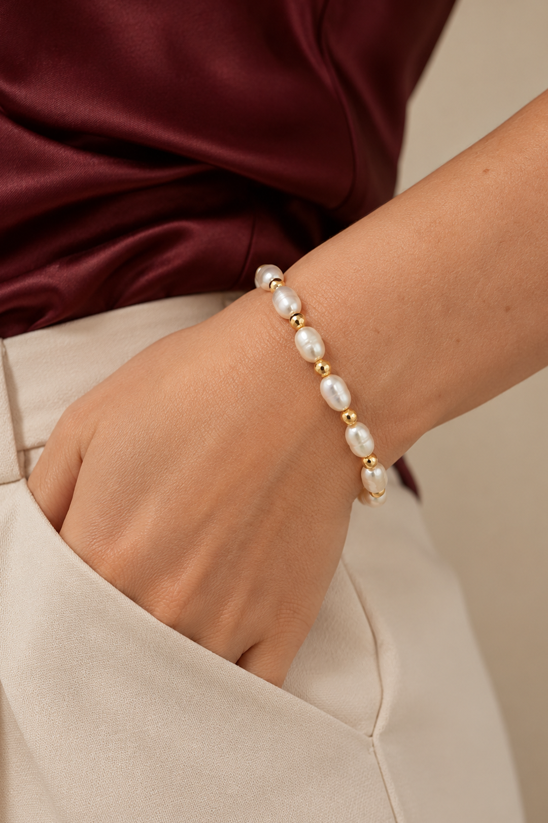 Pulsera Perla Oval Blanca y Pirita Dorada