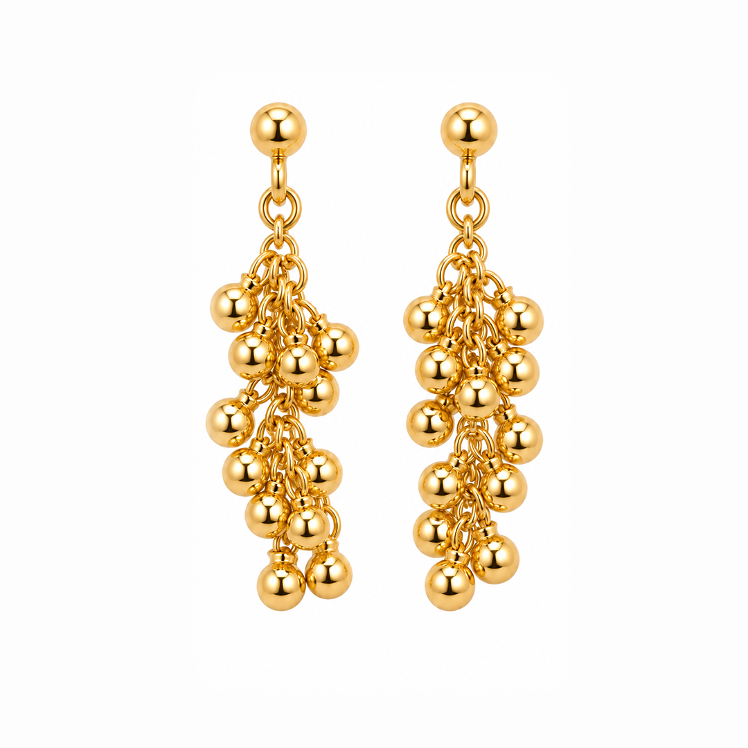 Aretes Icónica Bolitas Despeinadas